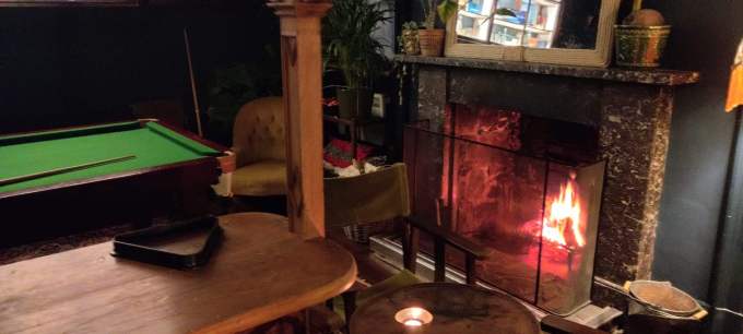 Small games room with and open fire 